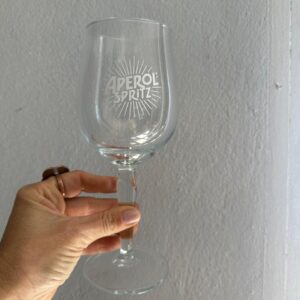 LOTE ÚNICO - 06 TAÇAS APEROL - LOGO GRANDE E PÉ TORNEADO - VIDRO - NOVOS — F066.31